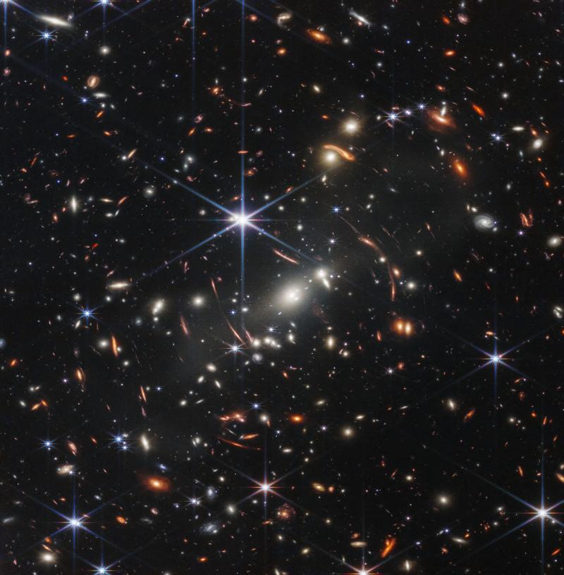 The first image from the James Webb Space Telescope unveiled on July 11, 2022 by NASA shows a galaxy cluster