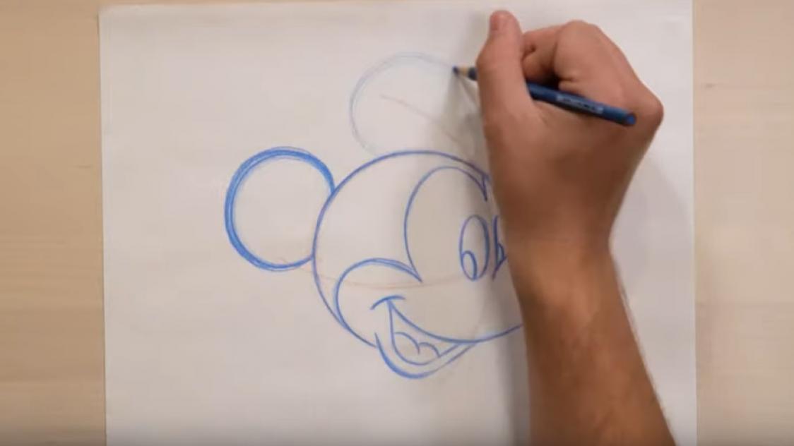 Aladdin dessine quelque chose